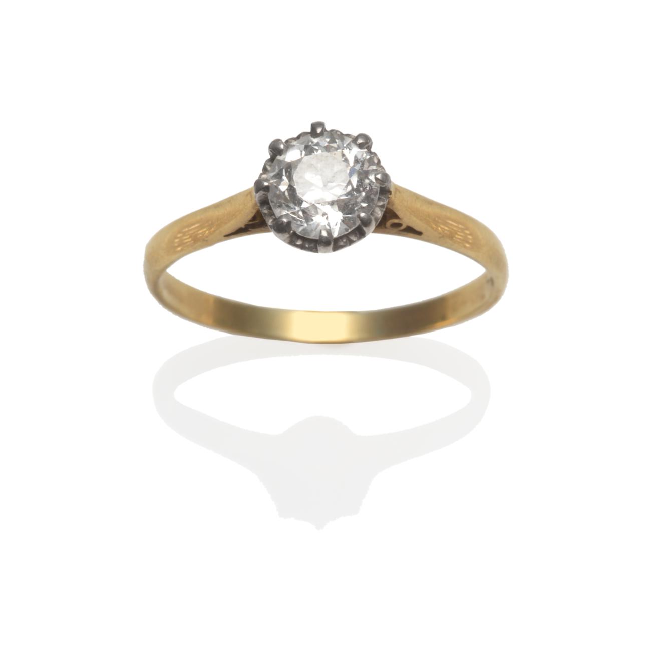 Lot 214 - A Diamond Solitaire Ring, an old cut diamond in a white claw and collet setting on a yellow tapered