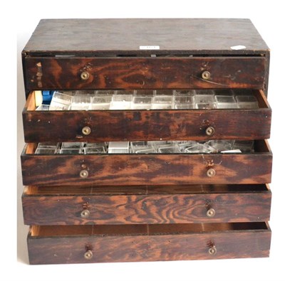 Lot 2161 - A Four Drawer Wooden Chest Containing a Collection of Mainly Trout Flies, most housed in...