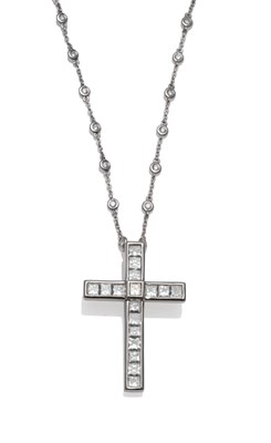 Lot 220 - A Diamond Cross on Chain, princess cut diamonds in white channel settings form the cross, total...