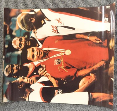 Lot 2010B - Muhammad Ali Signed Photograph with Ali standing with the USA Basketball team 16x20"