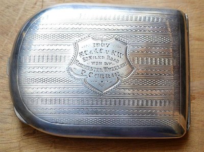 Lot 1013 - An Edwardian Silver Presentation Cigarette Case, Birmingham 1906, the rounded rectangular case with