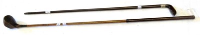 Lot 1040 - A Sunday Golf Club Walking Stick, in the form of a driver, with horn inset to foot and silver...