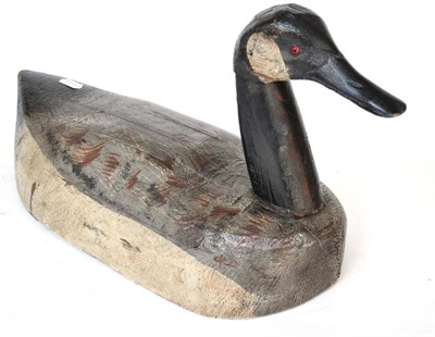 Lot 1087 - A Large Painted Wooden Decoy of a Canada Goose, with glass eyes, length 49cm