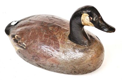 Lot 1088 - A Painted Wooden Decoy of a Canada Goose, with lead weight to base, length 38cm