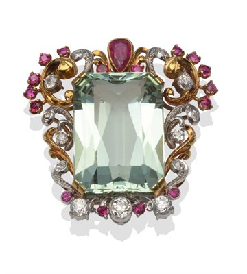 Lot 231 - An Aquamarine, Ruby and Diamond Brooch/Pendant, the large step cut aquamarine of approximately...