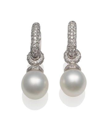 Lot 233 - A Pair of 18 Carat White Gold Diamond and Cultured South Sea Pearl Earrings, pavé set diamond cuff
