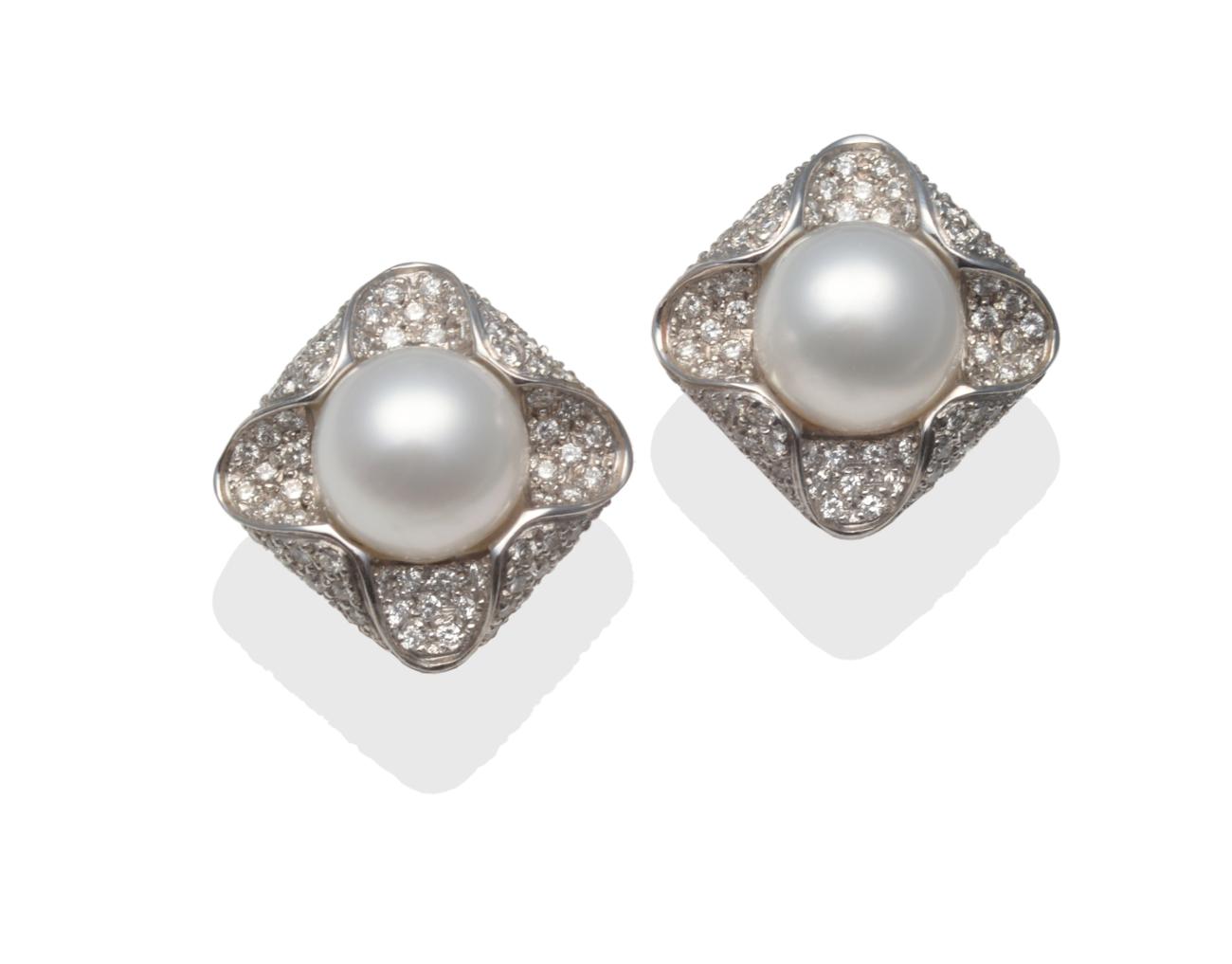 Lot 234 - A Pair of South Sea Cultured Pearl and Diamond Earrings, the cultured pearls set within a...