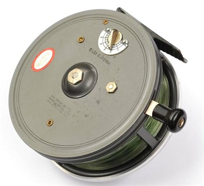 Lot 1141 - A Boxed Hardy 4in Alloy 'Silex Superba' Reel, with twin black handles on pierced drum, notched...