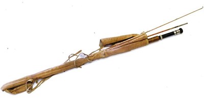 Lot 1174 - A 3pce Split Cane 'Peerless' Fly Rod, in a rod bag, together with An Alloy Fly Reel, in card...