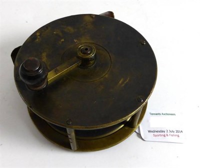 Lot 1230 - A Graham of Cockermouth 3 1/2"; Brass 'Clockmaker' Reel, with turned handles on brass arm,...