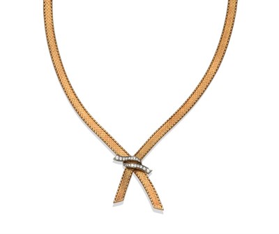 Lot 249 - An 18 Carat Gold Necklace, the crossover necklace in a textured block style, two rows of round...