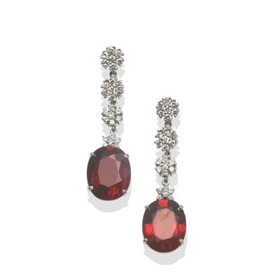 Lot 258 - A Pair of 18 Carat White Gold Garnet and Diamond Drop Earrings, clusters of round brilliant cut...