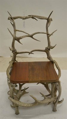 Lot 2128 - A Red Deer Antler Framed Open Chair, 20th century, with triple ";ladder"; back, with wooden...