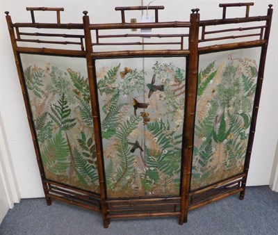 Lot 2133 - A Three-Fold Glazed Room Screen, circa 1880, with 'bamboo' frame, the panels enclosing...
