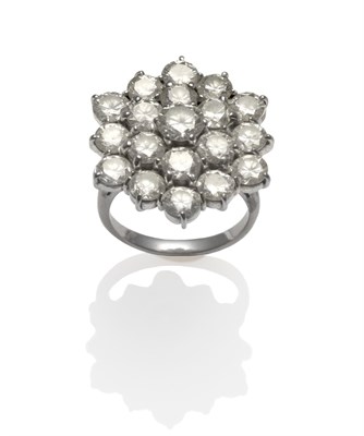 Lot 273 - A Diamond Cluster Ring, nineteen round brilliant cut diamonds in a three row cluster, in white claw
