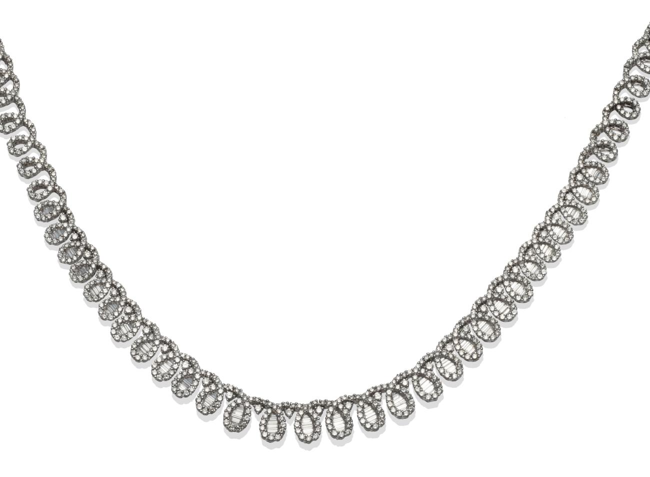 Lot 274 - A Diamond Necklace, of articulated graduated