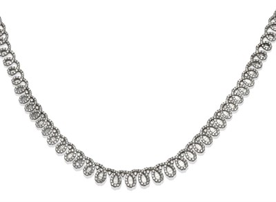 Lot 274 - A Diamond Necklace, of articulated graduated loop form, set throughout with round brilliant cut...