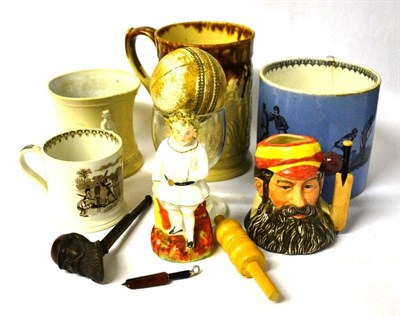 Lot 1020 - Cricket Memorabilia, comprising four pottery mugs, a glass inscribed 'cricket', a figure of a...