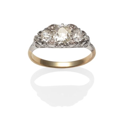 Lot 295 - A Diamond Ring, five graduated old cut diamonds with pairs of rose cut diamond accents in...