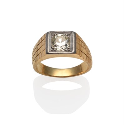 Lot 305 - A Diamond Solitaire Ring, the oval old cut diamond in white claws within a squared mount, to a...