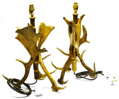 Lot 1222 - A Pair of Tripod Deer Antler Electric Table Lamps, of rustic interwoven antlers and beam...