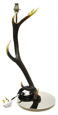 Lot 1223 - A Deer Antler 7-Point Table Lamp, set on circular chromed metal base, 55cm high