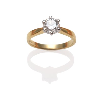 Lot 315 - An 18 Carat Gold Diamond Solitaire Ring, a round brilliant cut diamond in a white six claw...