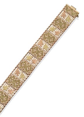 Lot 323 - A Two Colour Gold Bracelet, the rose coloured gate bracelet overlaid with textured leaf motif...