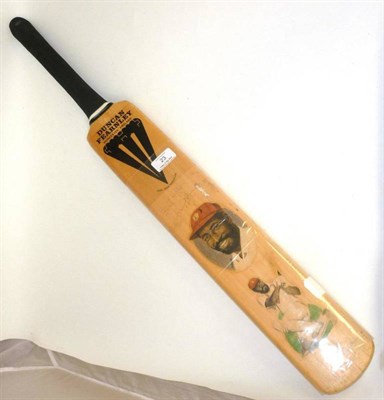 Lot 23 - A Signed Limited Edition Viv Richards Cricket Bat, decorated with two colour illustrations and...