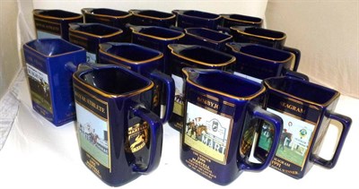 Lot 74 - Sixteen Martell Grand National Winners Water Jugs, limited edition of 10,000, blue ceramic jugs...