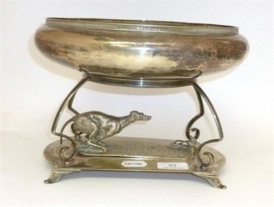 Lot 93 - A Silver Plated Hare Coursing Centrepiece,  the shallow circular bowl with pierced gallery, set...