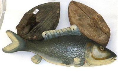 Lot 105 - Two Wooden Duck Decoys, with weighted bases, unpainted, length 33cm; A Painted Tinplate Fish Decoy