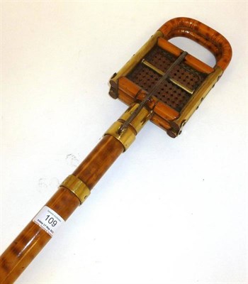 Lot 109 - A Bamboo Shooting Stick, with folding cane seat and brass fittings, steel ground spike