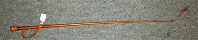 Lot 115 - A Silver Mounted Leather Whip by Swaine, with London hallmarks, leather wrist strap