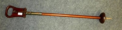 Lot 132 - A Shooting Stick, stamped 'J Purdey & Sons' to the underside of the folding walnut seat, also...