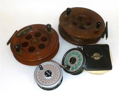 Lot 163 - Two 7"; Wooden Sea Reels, with twin bulbous handles, brass feet, one with makers label,...