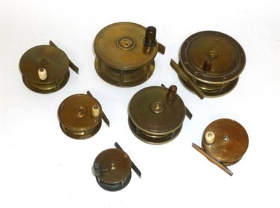 Lot 175 - Seven Brass Reels, no makers names, including two with ebonite backs, two crankwind, the others...