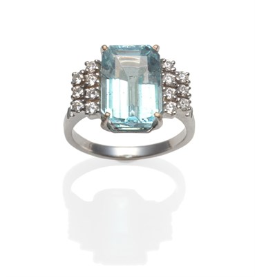 Lot 367 - An Aquamarine and Diamond Ring, an emerald-cut aquamarine within two rows of round brilliant...