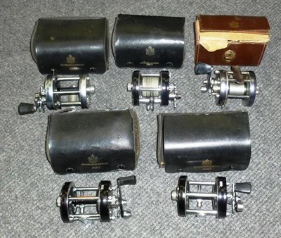 Lot 238 - Five Cased Abu Ambassadeur Multiplying Reels - 5500C with grey finish, 6500C with silver...