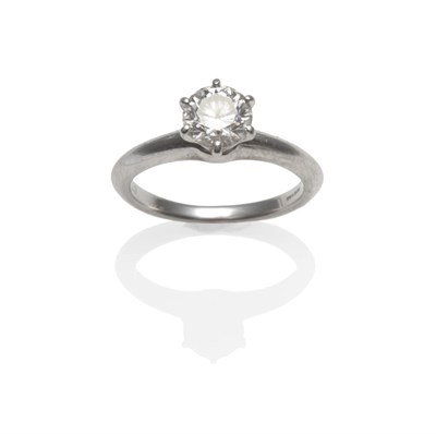 Lot 379 - A Platinum Diamond Solitaire Ring, by Tiffany & Co., the round brilliant cut diamond in a six...