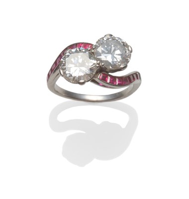 Lot 391 - An Art Deco Diamond Two Stone Twist Ring, two old brilliant cut diamonds in white claws to...