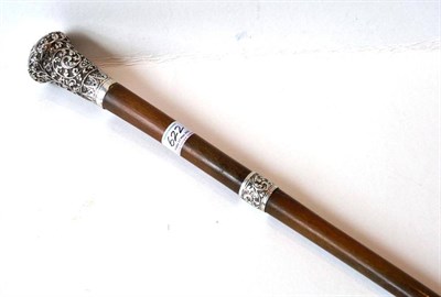 Lot 622 - A White Metal Mounted Rhinoceros Horn Walking Cane, circa 1880, the swollen pommel with foliate...