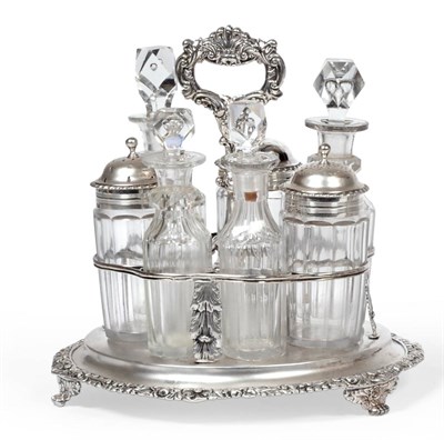 Lot 430 - A George IV Silver Cruet Stand, Jonathan Hayne, London 1822, the circular base with a cast...