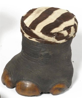 Lot 138 - African Elephant (Loxodonta africana), circa 1910, foot stool, with stuffed Zebra skin cushion...