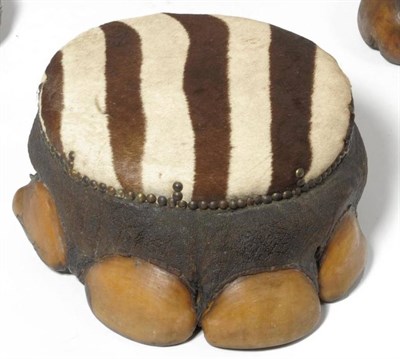 Lot 141 - African Elephant (Loxodonta africana), circa 1910, foot stool, with close nailed Zebra hide...