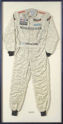 Lot 1 - A Mika Hakkinen Signed Sparco Promotional Formula One Drivers Suit, identical to a race suit but to