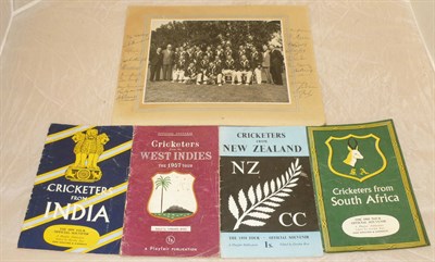 Lot 12 - A Signed Photograph of the 1954 Australian Cricket Team, with twenty one pen signatures in the...