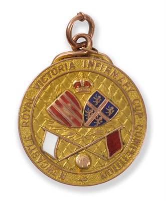 Lot 22 - A 9ct Gold and Enamel Newcastle United Football Club Medal, issued for the Newcastle Royal Victoria