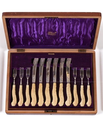 Lot 455 - A Victorian Twelve Place Setting of Silver and Ivory Fruit Knives and Forks, Martin, Hall & Co...