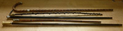 Lot 63 - Four Vintage Walking Sticks/Canes, comprising a holly stick with antler handle, a knurled stick...